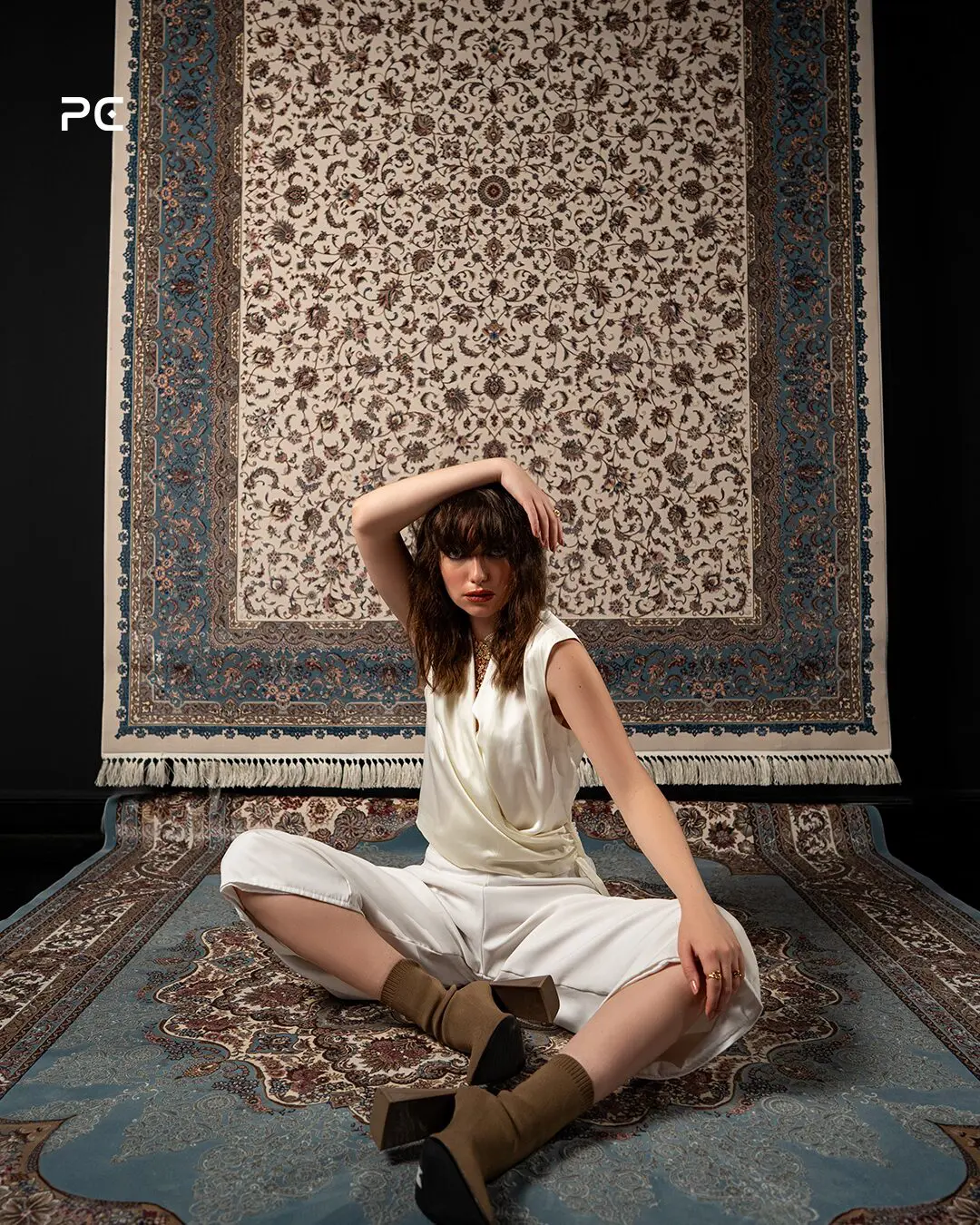 Point Carpet heritage campaign — model styled on Persian carpet by CEMA